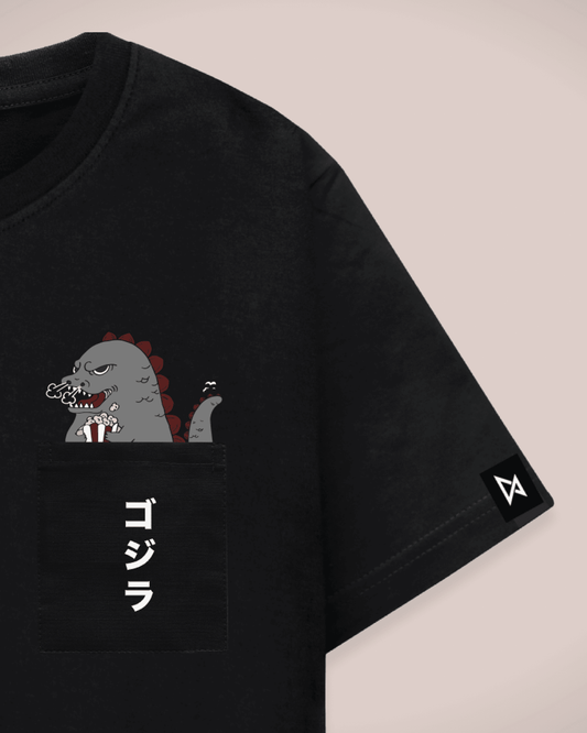 Datclothing - Black T-Shirt with Godzilla eating popcorn print and pocket - Zoomed in on the pocket design