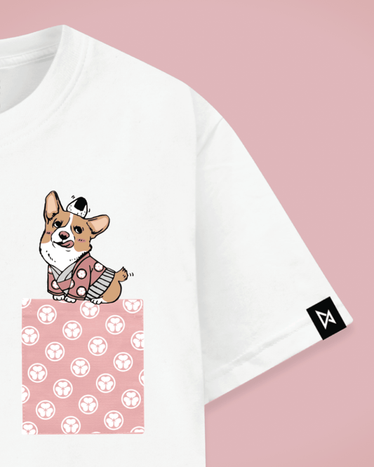 Datclothing - Print view - White t-shirt with pink pocket and Welsh Corgi balancing an Japanese snack onigiri print
